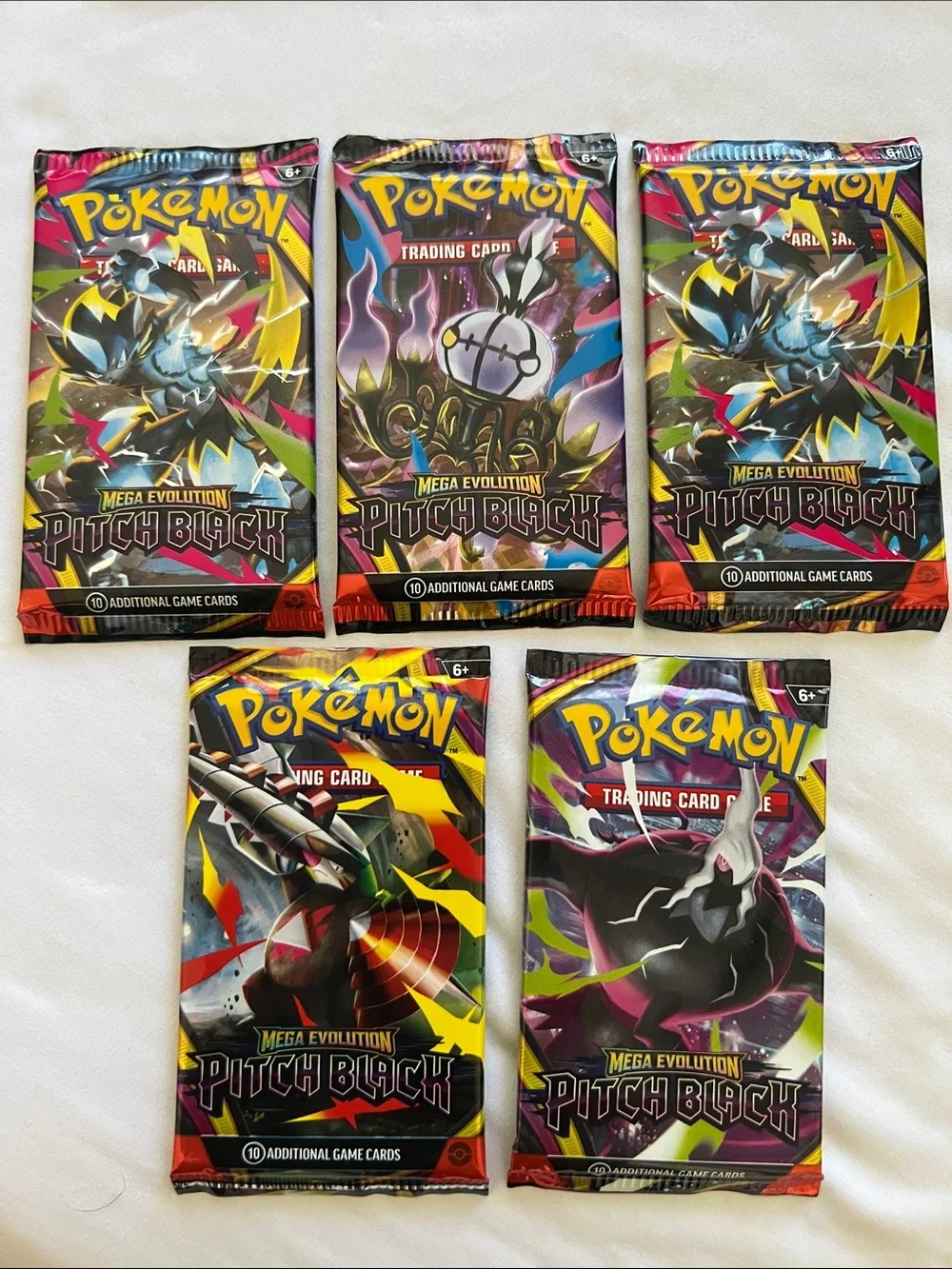 Pokemon Pitch Black Booster Packs - Yellow, Black, Purple, Red